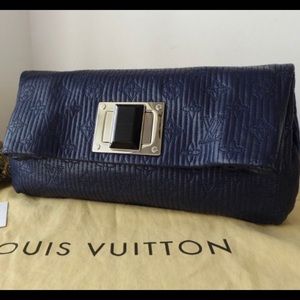 Authentic Louis Vuitton Altair Clutch Monogram